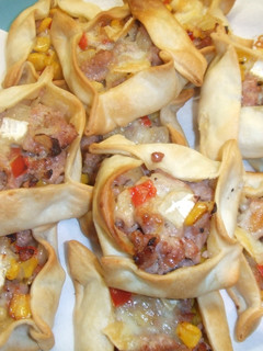 Una foto de Pastelitos de carne de salchicha y maíz