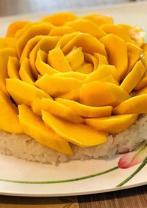 A picture of White rice with Mangos.