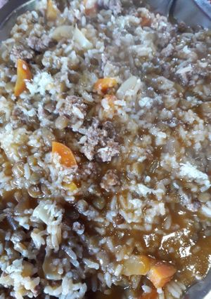 Una foto de Guiso de arroz y lentejas