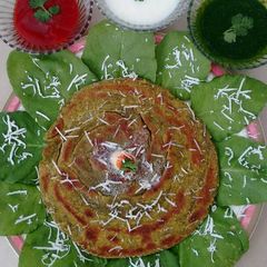 A picture of Lachha paalak paratha in multigrain atta.