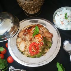 A picture of Arabic Biryani -Chicken Maqlooba.