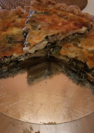 Una foto de Tarta de verdeo y champignons