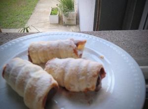 Una foto de Cañoncitos de Dulce de Leche con tapa de pascualina