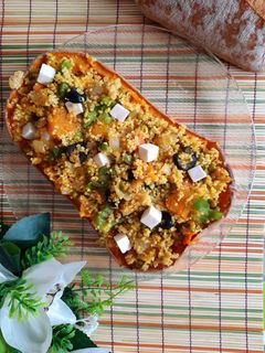 Una foto de Calabaza asada rellena de cuscús