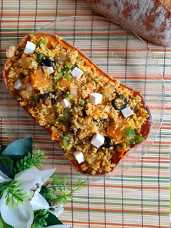 Una foto de Calabaza asada rellena de cuscús