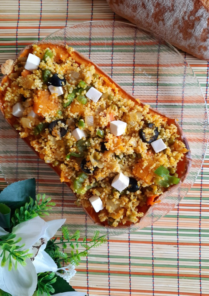 Una foto de Calabaza asada rellena de cuscús