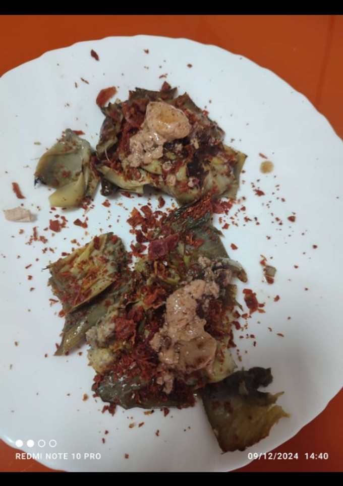 Una foto de Corazones de alcachofa con virutas de jamón y foie