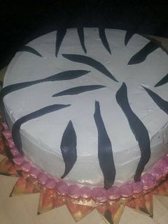 Una foto de Tarta cebra (chocolate y albaricoque)