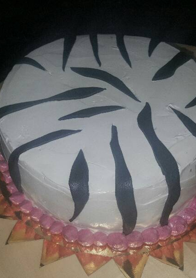 Una foto de Tarta cebra (chocolate y albaricoque)