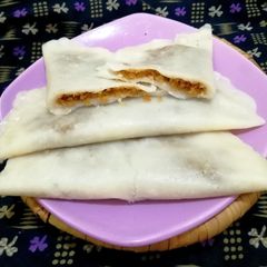A picture of Ella ada Steamed rice Pancakes With Coconut & Jaggery Filling.