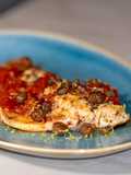 Filetto di Branzino con Taggiasche e Datterini