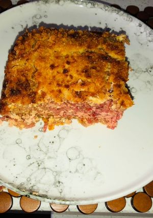 Una foto de Budín de arroz rojo y queso