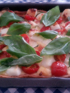Una foto de Quiche de calabacín y tomatitos