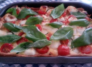 Una foto de Quiche de calabacín y tomatitos