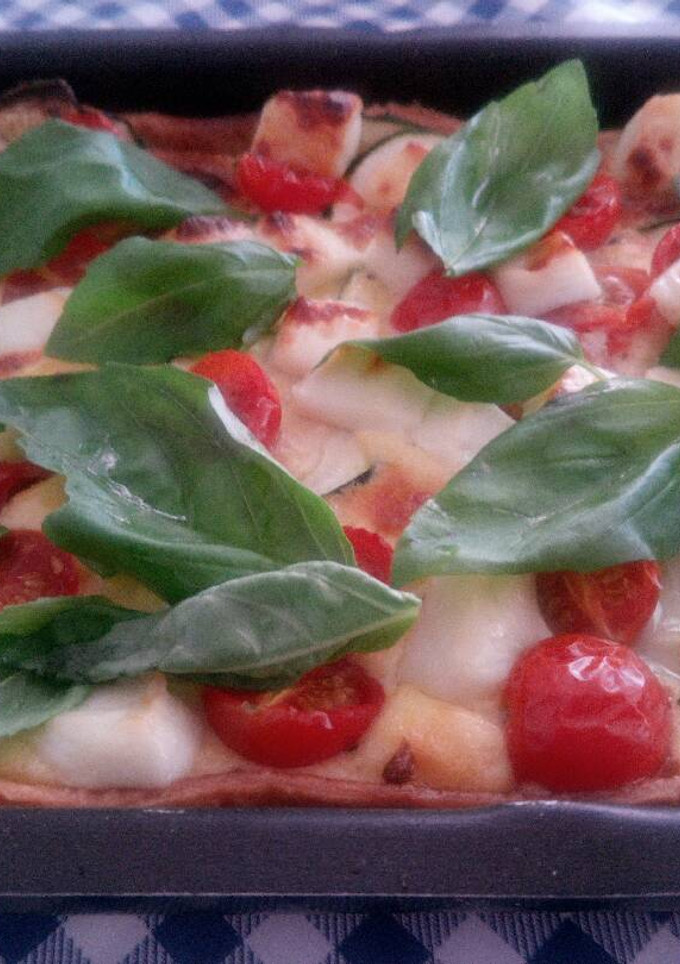 Una foto de Quiche de calabacín y tomatitos
