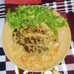 A picture of Radies (muli paratha).
