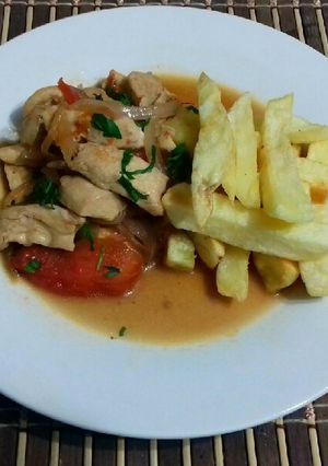 Una foto de Lomo al Jugo de Pollo