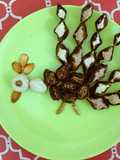 Dryfruits sweet in Peacock pattern