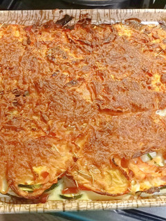 Une photo de Courgettes, tomates et lardons gratinés au four au Cook Expert