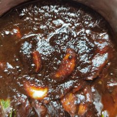 A picture of Dates and tamarind pickle Juicy texture.