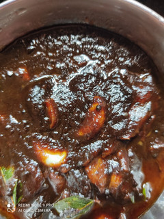 A picture of Dates and tamarind pickle Juicy texture.