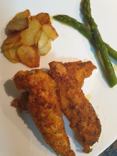 Una foto de Fingers de pollo crunchy crumbs con especias