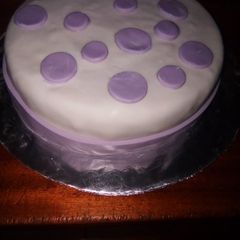 A picture of Oreo cake covered in fondant.