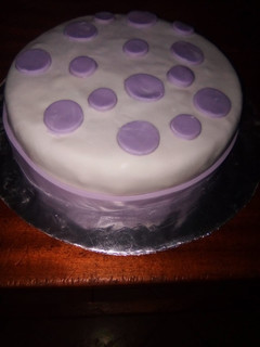 A picture of Oreo cake covered in fondant.