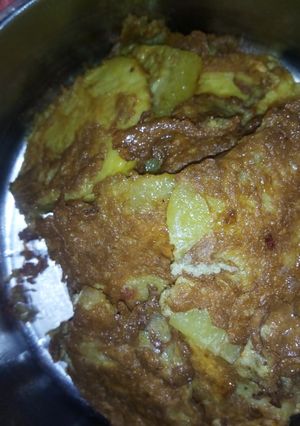 A picture of Fried potatoes with egg.