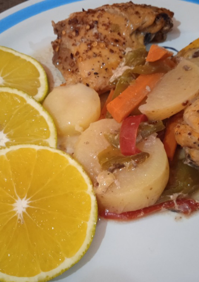 Una foto de Pollo a la naranja en olla de cocción lenta