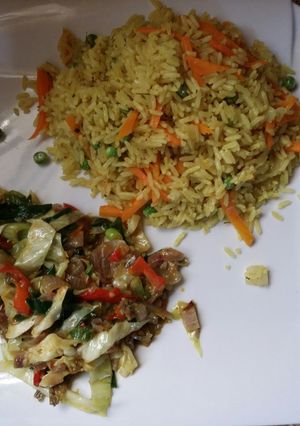 A picture of Fried rice with mackerel vegetable sauce.