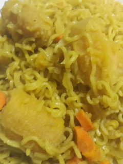 A picture of Indomine with carrots and plantain.