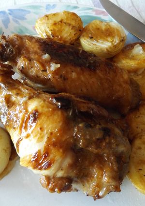Una foto de Alones de pavo asadas con cítricos y ron