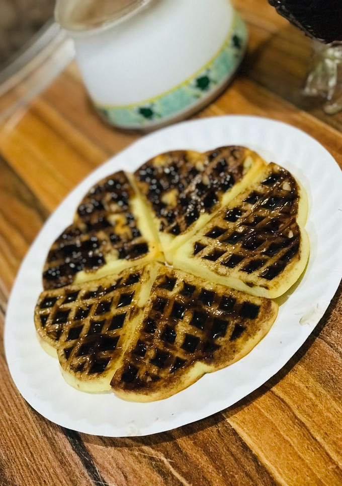 A picture of Waffles with topping.