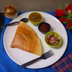 A picture of Schezwan pav bhaji dosa.