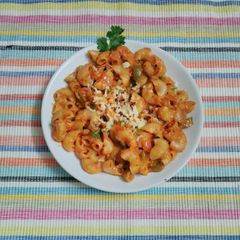 A picture of Red sauce macaroni pasta lndian style.