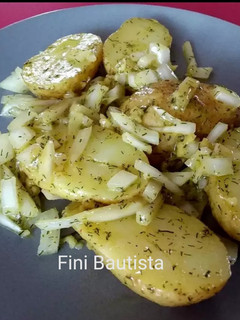 Una foto de Patatas de guarnición aliñadas