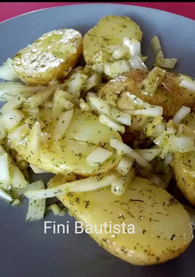 Una foto de Patatas de guarnición aliñadas