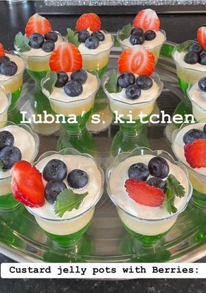 A picture of Custard jelly pots with Berries:.