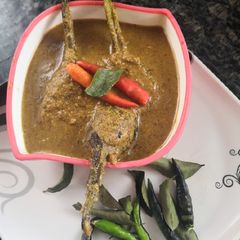 A picture of Kaale masale mein baigaan.