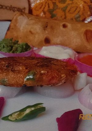 A picture of Peshawari baingun k chapli kabab.