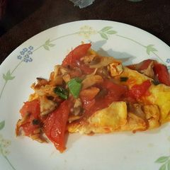 A picture of Eggs & tomatoes.