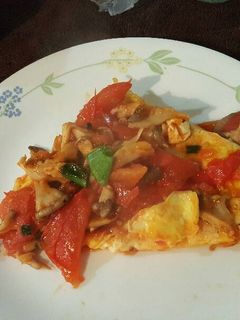 A picture of Eggs & tomatoes.