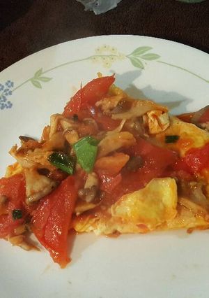 A picture of Eggs & tomatoes.