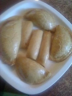 A picture of Beef pie and fish rolls (baked).