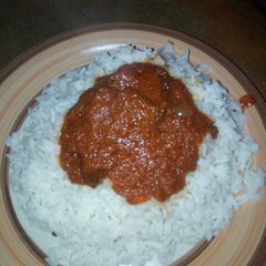 A picture of White rice and stew.