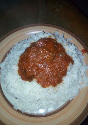 A picture of White rice and stew.