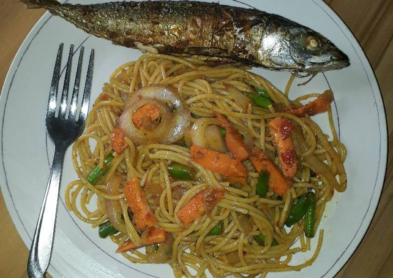 Stir fried spaghetti jollof