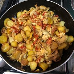 A picture of Irish potatoes with chicken and egg.