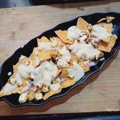 A picture of Creamy Fried chicken Nachos.